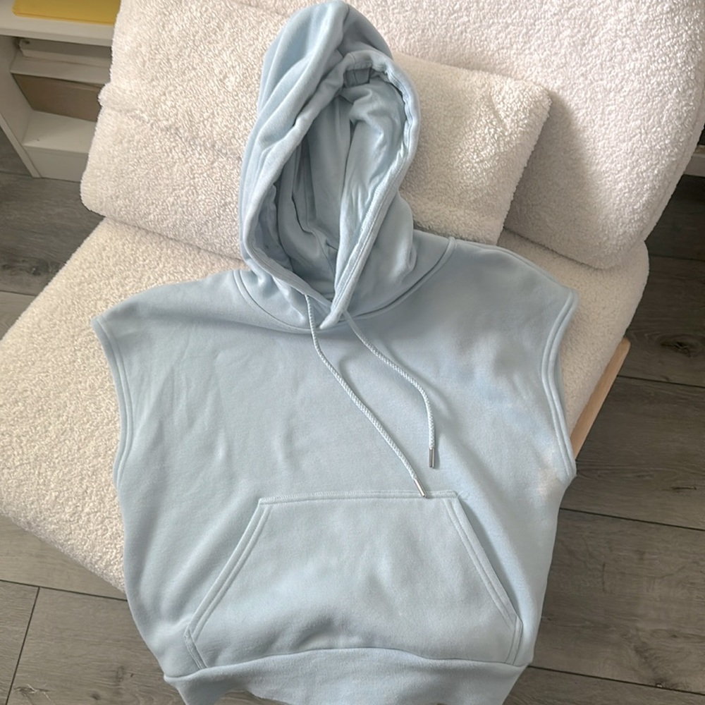 Super cute baby blue sleeveless hoodie from Fabletics. Super soft size xs